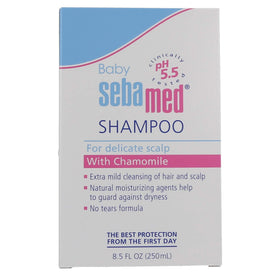 SEBAMED bottle beside bathtub illustrating calming baby bath use
