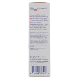 Parent washing infant with SEBAMED shampoo showing tear-free comfort