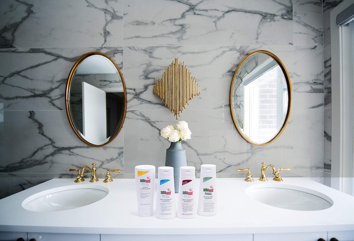 SEBAMED shampoo lather texture on hand demonstrating mild foam and gentle rinse