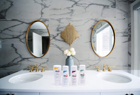SEBAMED shampoo lather texture on hand demonstrating mild foam and gentle rinse