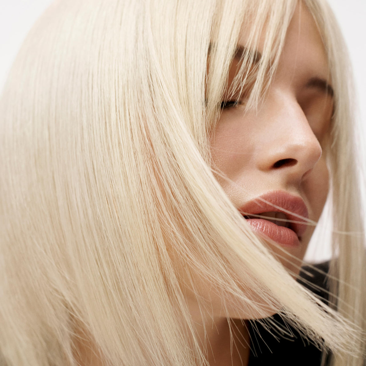 Sebastian after-wash shiny hair illustrating glossy, smooth finish
