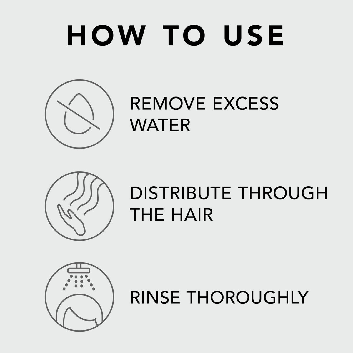Hand applying Sebastian conditioner to damp hair for smoother detangling