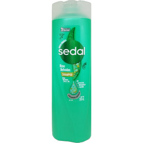Hand holding Sedal cream demonstrating application and lightweight finish benefit