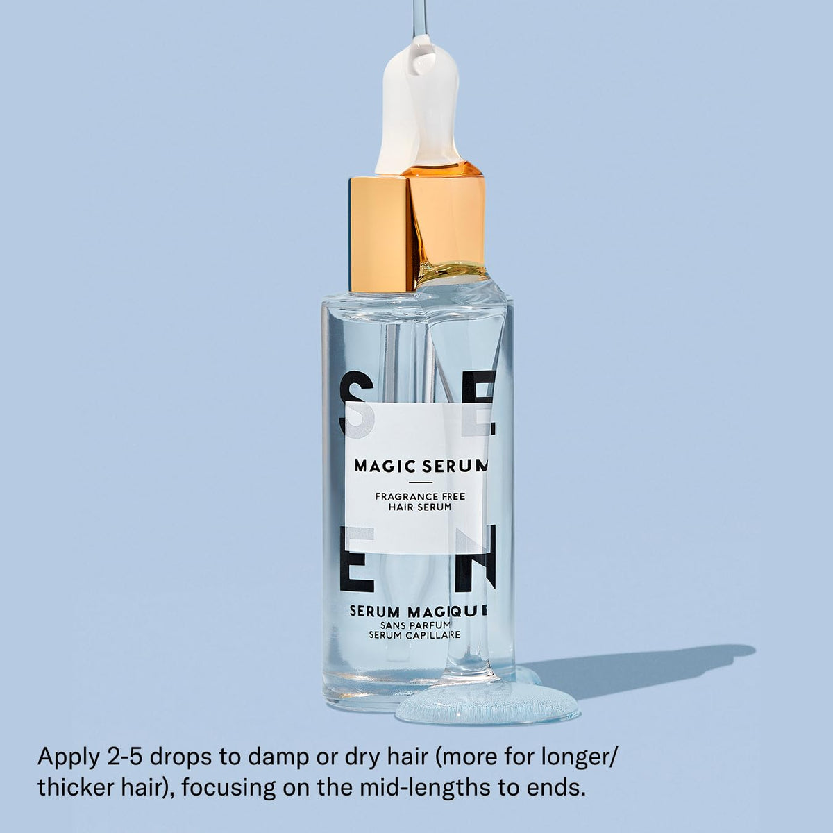 SEEN Magic Serum beside styling tools, protects hair from heat damage