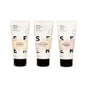 SEEN mini shampoo, conditioner, and blow-out cream displayed to show TSA sizes