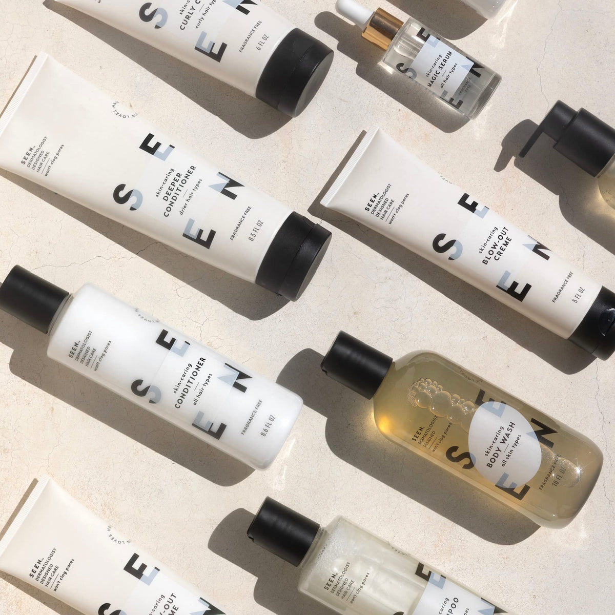 SEEN botanical ingredients flatlay showing plant-derived protection and shine
