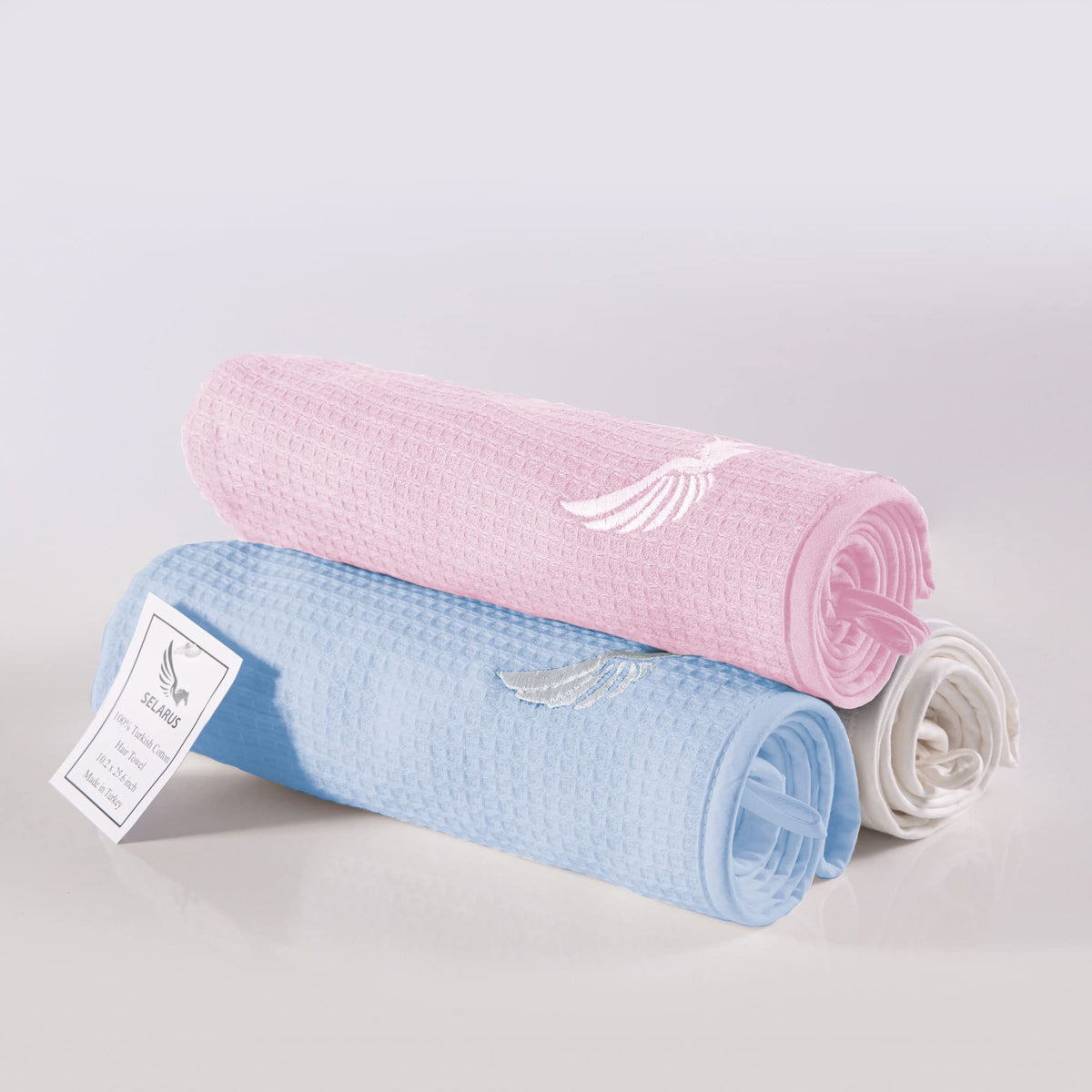 SELARUS towel packed for travel in a bag, lightweight and space-saving