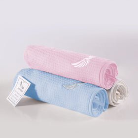 SELARUS towel packed for travel in a bag, lightweight and space-saving
