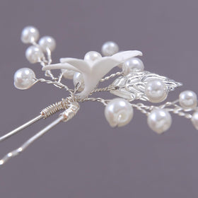 SELFCLOUD bride wearing pins in outdoor portrait adding elegant wedding detail