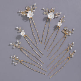 SELFCLOUD front view of nine gold pearl hair pins showing elegant presentation and ready-to-use benefit
