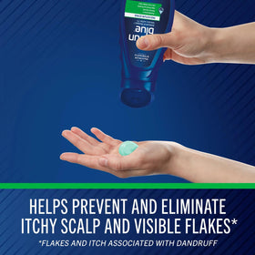 Selsun Blue bottles on bathroom shelf in lifestyle setting, suggests routine use