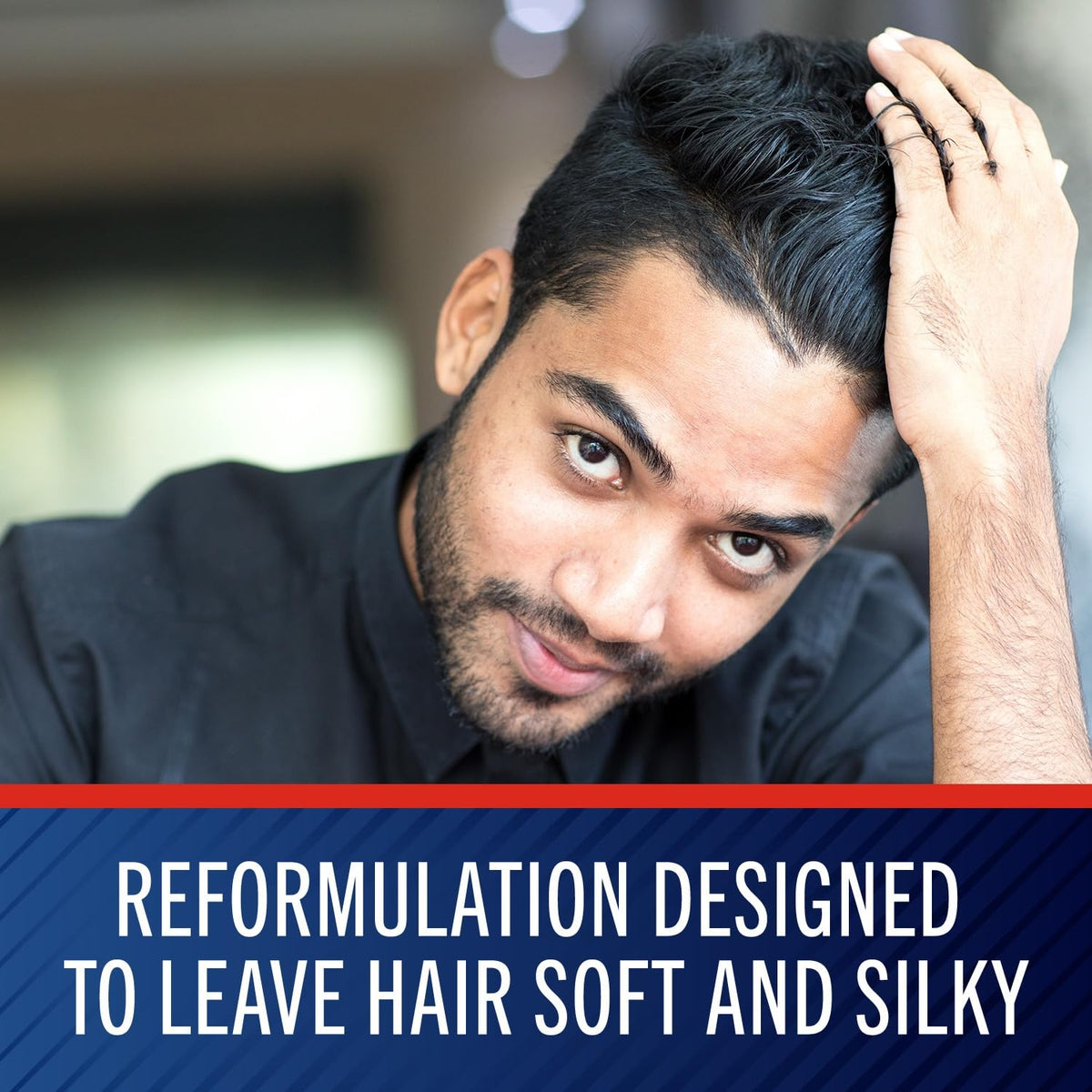 Selsun Blue shampoo in hand ready to apply for targeted scalp treatment