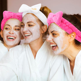 Semato headband in use during makeup application keeping hair away
