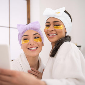 Semato headband beside ruler to show 13.78-inch stretch capacity for most adult heads