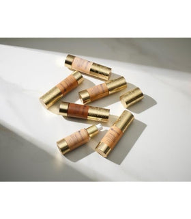 SeneGence applying tinted moisturizer with fingers demonstrating quick morning use