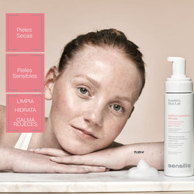 Sensilis bottle beside hand showing 200ml scale for easy size comparison