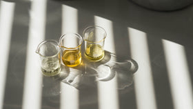 Senteurs d'Orient oil poured into bath scene creating relaxing spa-like aroma and soothing ambiance