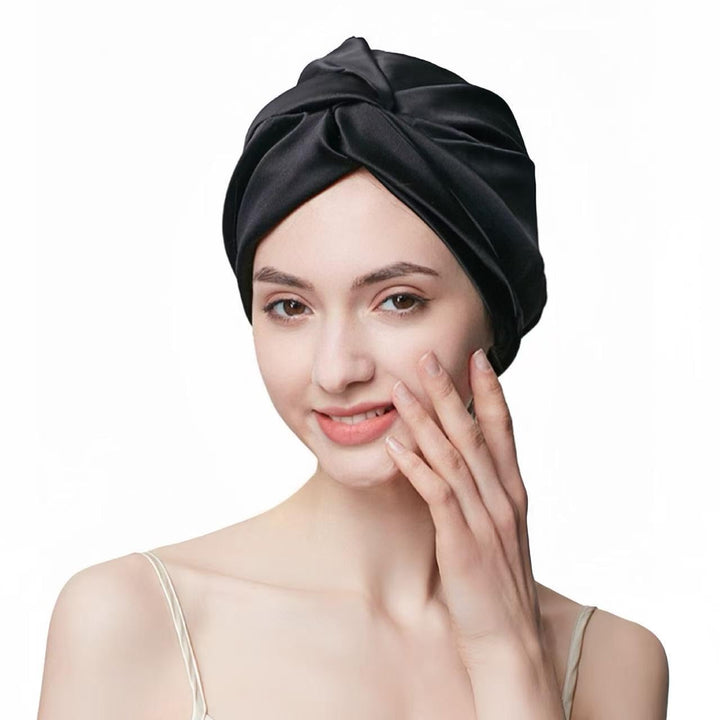 SereLune front view of black silk bonnet showing neat stitching and fit benefit