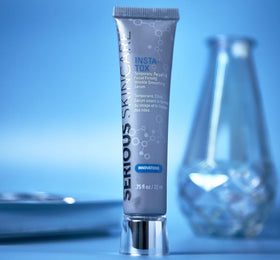 Serious Skincare drop of serum on fingertip showing small-dose control and even coverage benefit