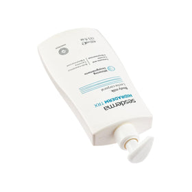 Sesderma label close-up focusing on tranexamic acid ingredient, signals tone-evening benefit