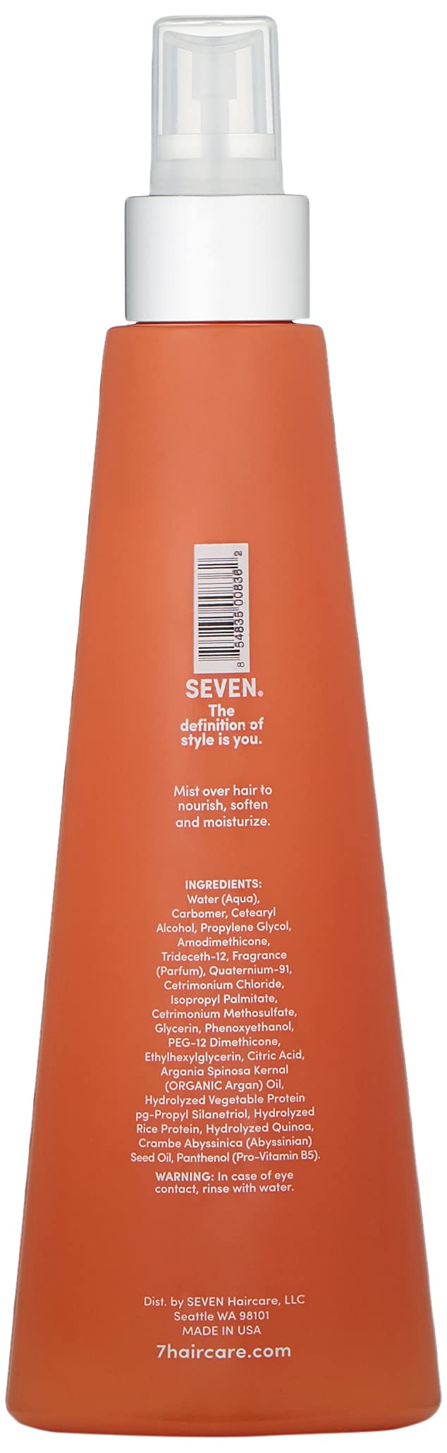 SEVEN spray action on damp hair demonstrating even distribution and slip