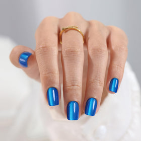 SHANGMENG front packaging showing Klein blue cat-eye nails and included accessories