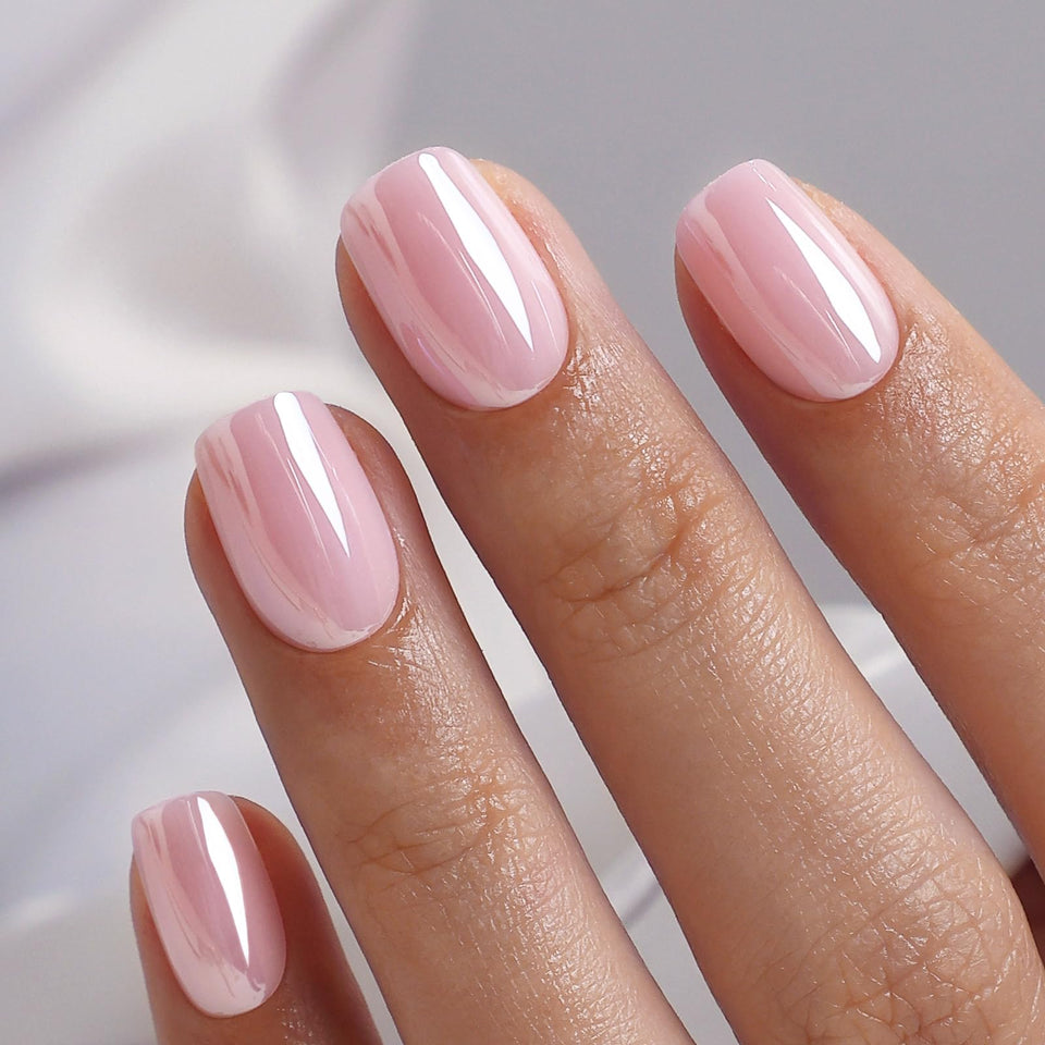 SHANGMENG front packaging showing aurora light pink glossy nails and included supplies