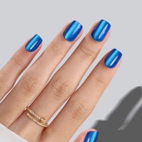SHANGMENG lifestyle shot of wearer at party showcasing Klein blue nails