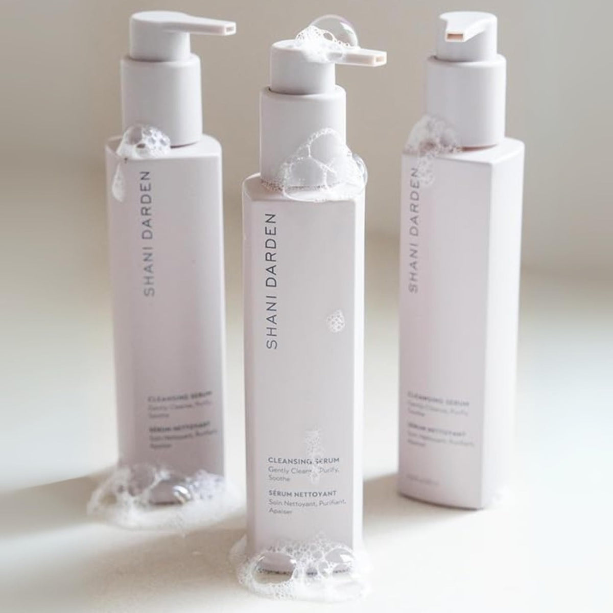 SHANI DARDEN bottle on bathroom shelf showing everyday routine fit