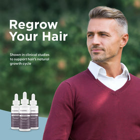Shapiro MD dropper applicator close-up for precise scalp targeting