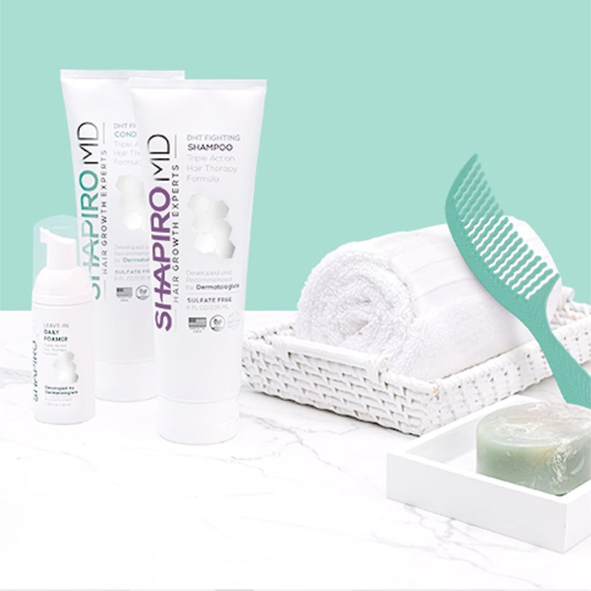 Shapiro MD shampoo lather in hands demonstrating rich cleansing without stripping benefit