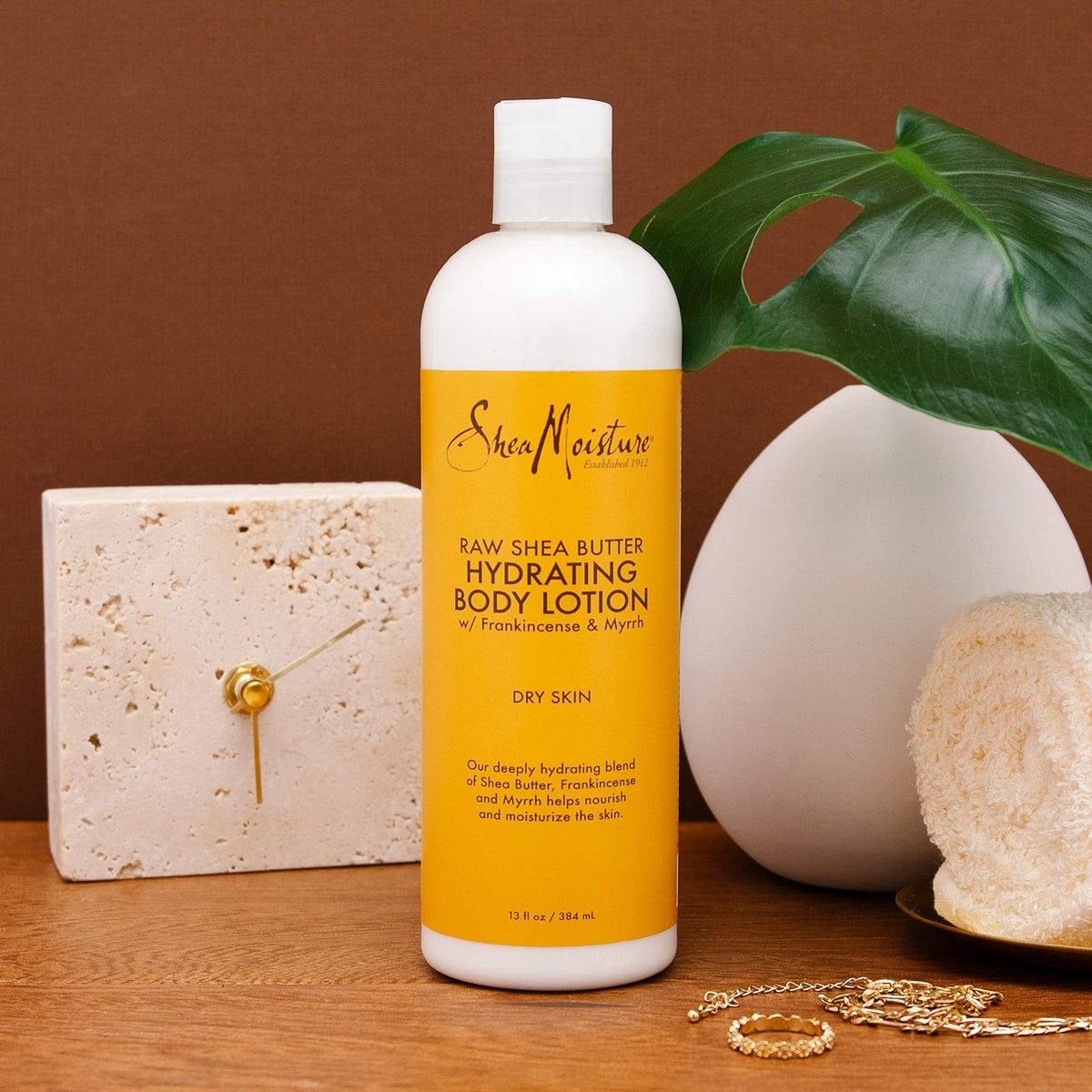 Shea Moisture label closeup highlighting ingredients and moisturizing benefit
