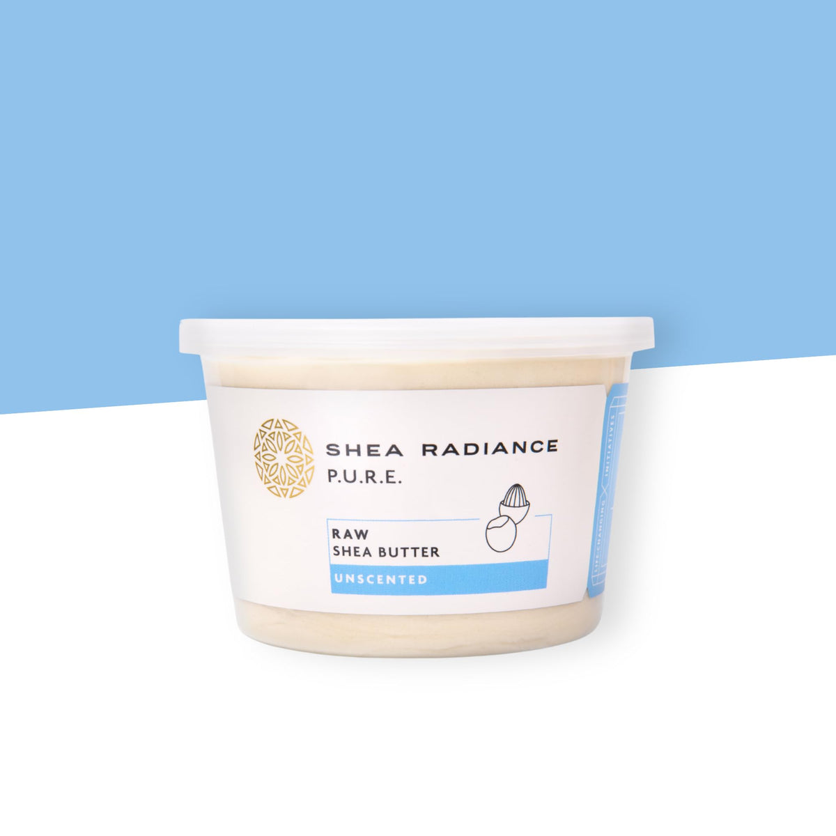 Shea Radiance jar beside common object to show 14 oz size