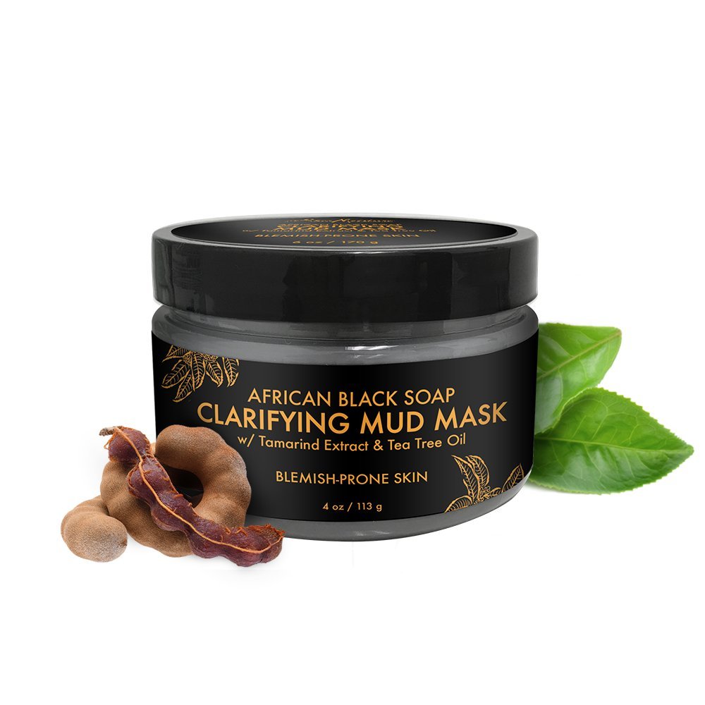 SheaMoisture open jar revealing thick dark mask texture