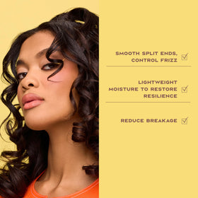Applying SheaMoisture leave-in while detangling hair to reduce breakage and add slip