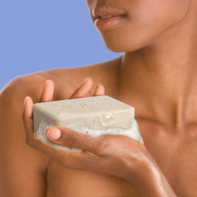 SheaMoisture bar on bathroom shelf suggesting a nourishing routine