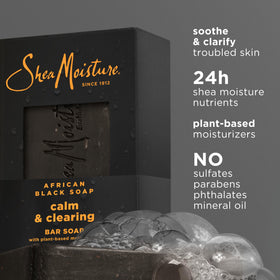 SheaMoisture bar lathered in hand demonstrating gentle cleansing action