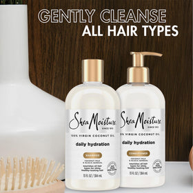 SheaMoisture conditioner being applied to wet hair for detangling and smoothing benefit