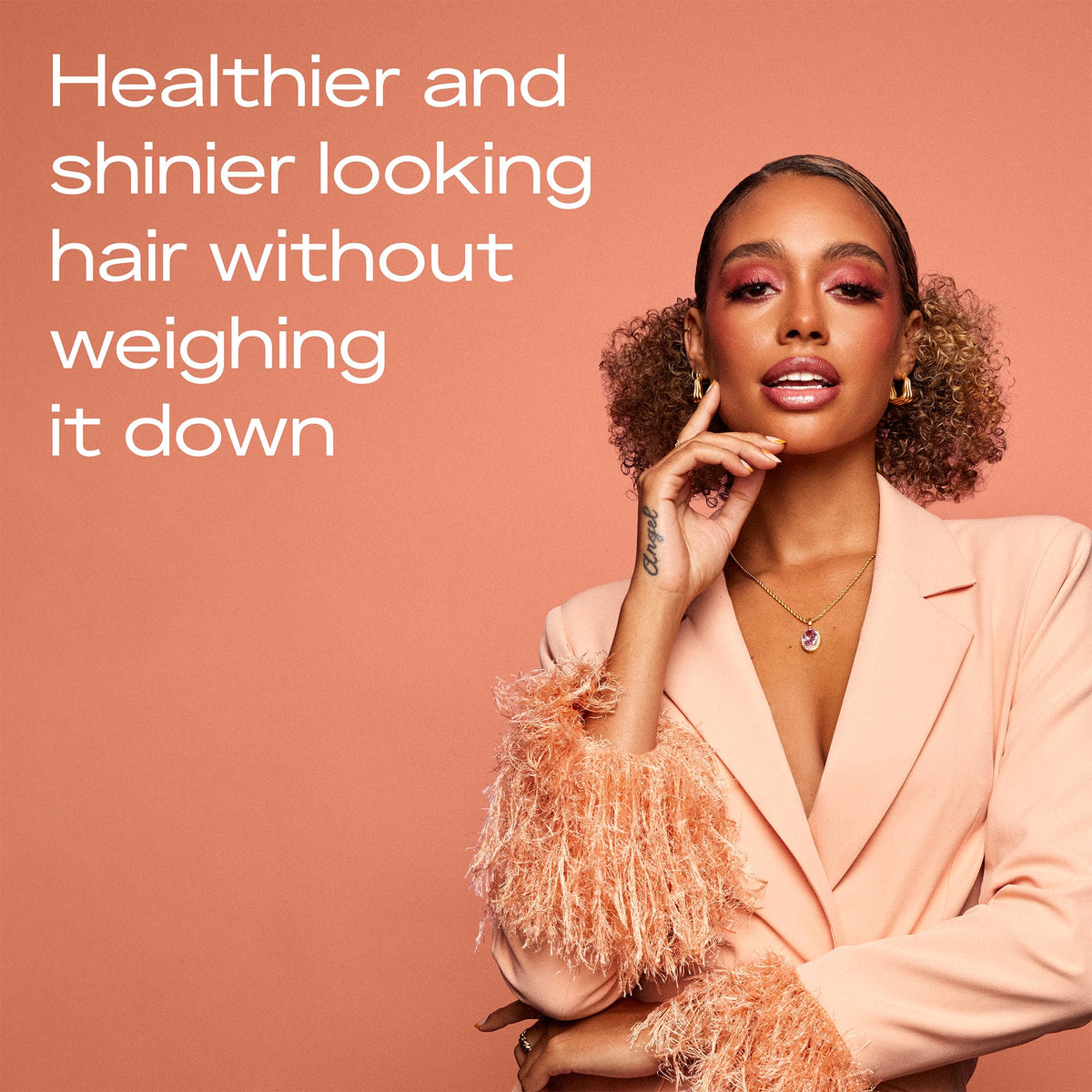 SheaMoisture products in hand during application showing easy use