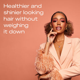 SheaMoisture products in hand during application showing easy use