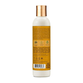SheaMoisture pump dispensing detangler illustrating easy application
