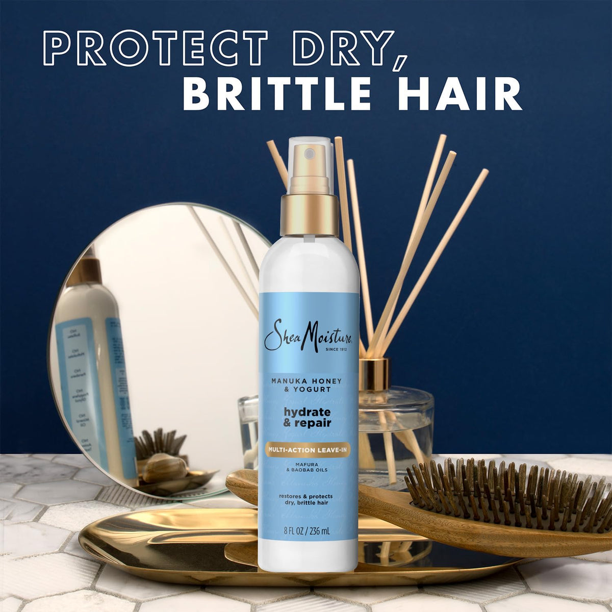 SheaMoisture bottle held in hand showing 8 oz scale and travel-friendly benefit