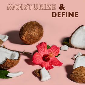 SheaMoisture styling in use parent applying products to child hair for gentler combing