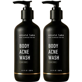 Shield bottle front packaging showing unscented acne body wash benefit