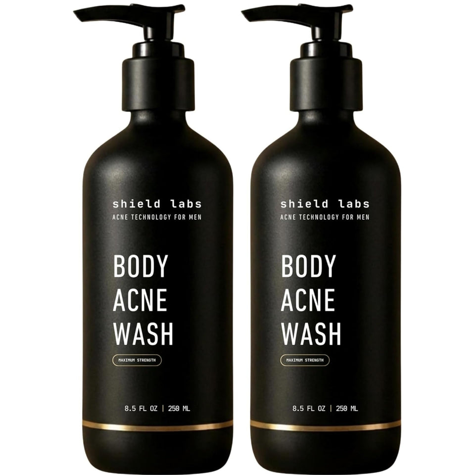 Shield bottle front packaging showing unscented acne body wash benefit
