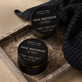 Shield moisturizer used after shaving in bathroom showing calming benefit