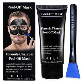 SHILLS front packaging showing compact charcoal mask and brush set, travel-friendly