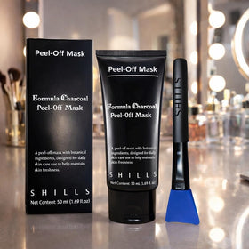 SHILLS peeled mask strip showing residue removal and visible cleansing