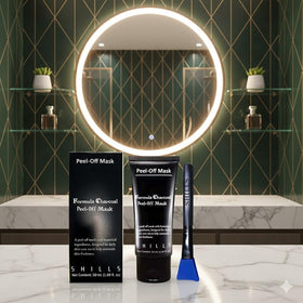 SHILLS mask beside ruler illustrating the 1.69 fl. oz bottle size
