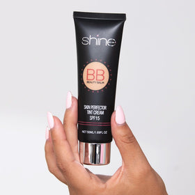 Shine BB Cream next to everyday essentials in bag showing travel-ready convenience benefit